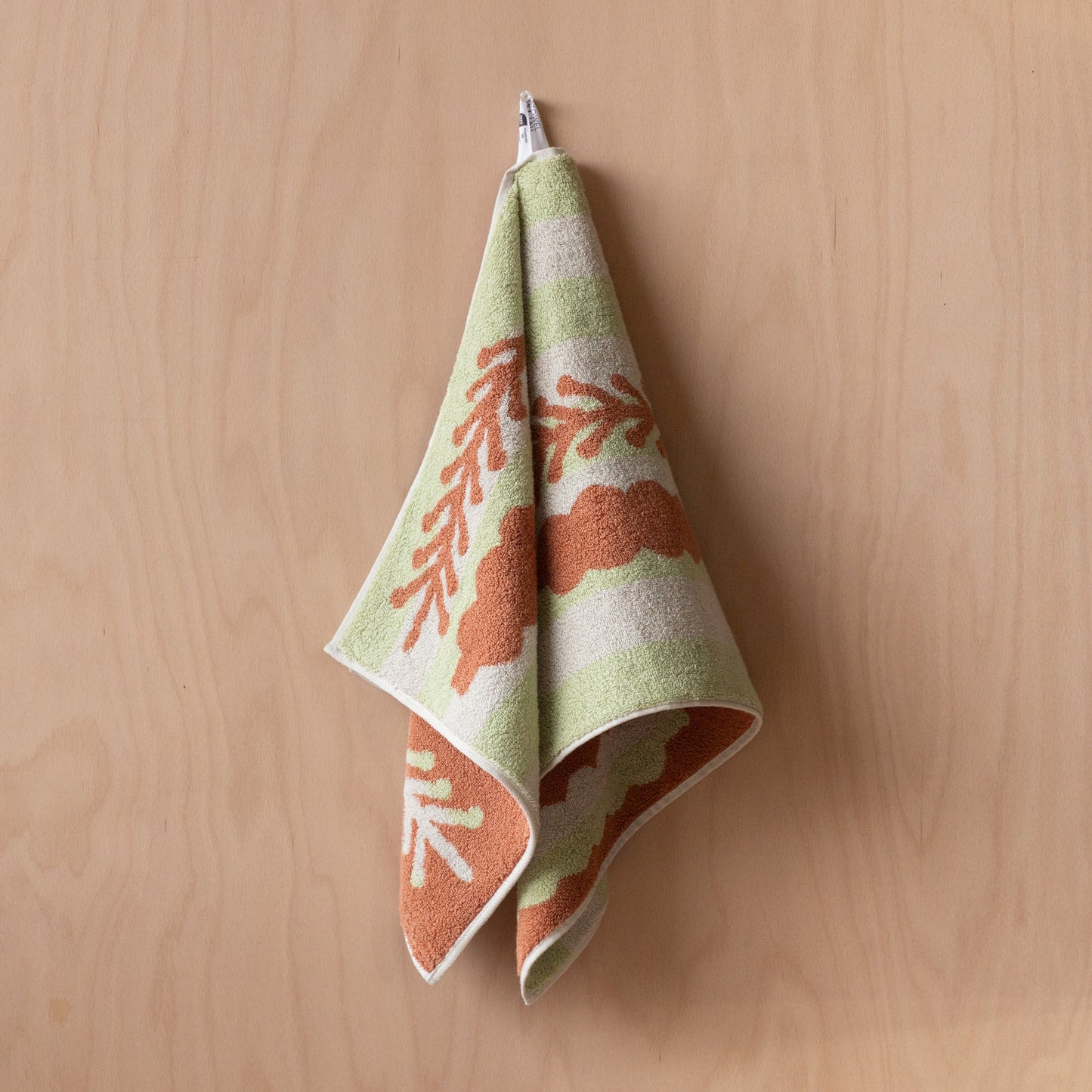 TREES FACE TOWEL - BRICK ON KHAKI