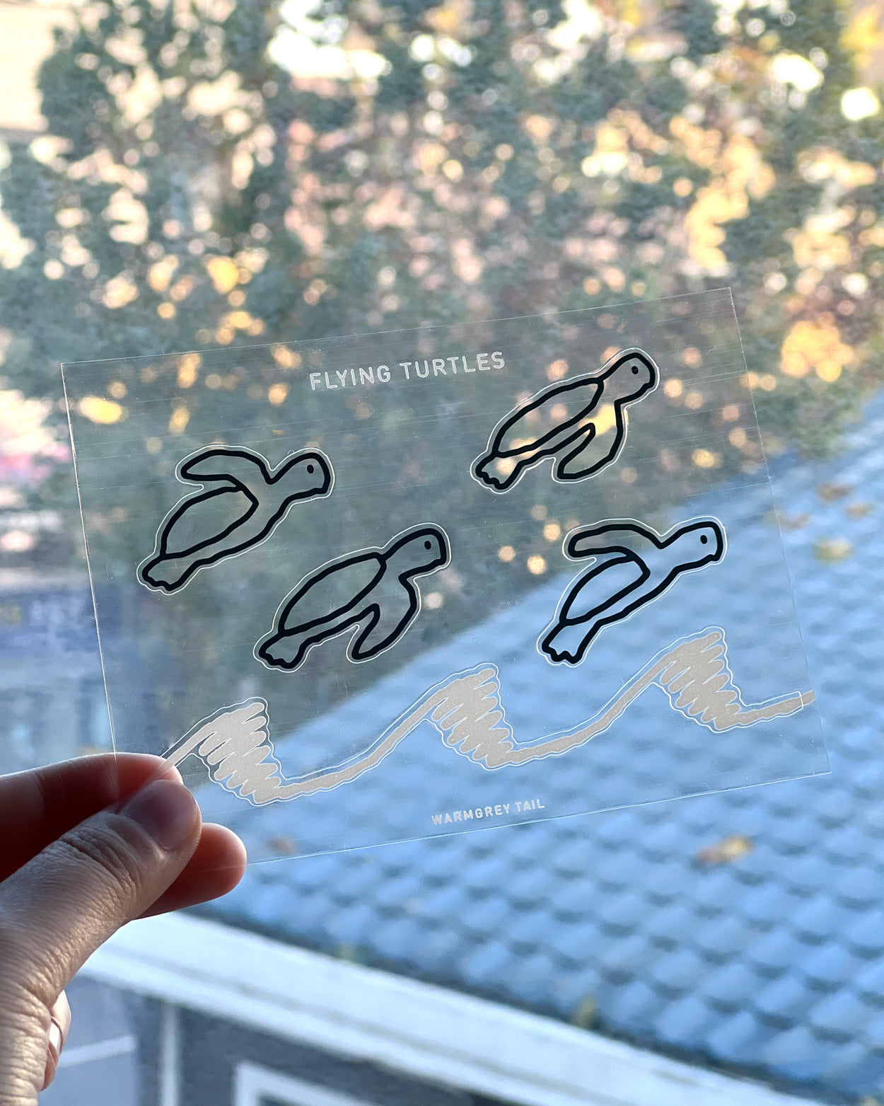 FLYING TURTLES STICKER